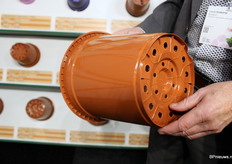 A new planting container with wide sliding rim.