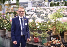 Lars Olsen of Dan Roses, a grower of potted roses and small Christmas trees. For years, he has seen the demand for his small Christmas trees increase.