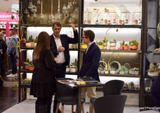 Meilin Beirer and Luca Zunino in conversation with a visitor.