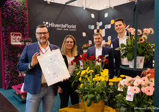 The proud team with the prize