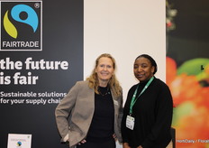 Monique Peters together with Amelia Watindi of Fairtrade. Proudly presented the first Faitrade Ponsetias.