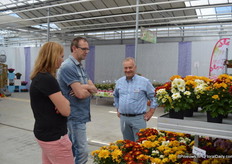 Mr. Brandkamp of Brandkamp talking with visitors.