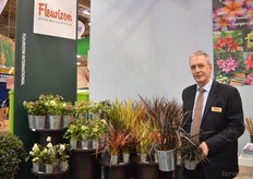 "Frank de Greef of Fleurizon. He is holding the phormium Black & Black and the Ophiopogon nigrescens Fleurizon is a broker that has a large assortment of special varieties and commodities. De Greef is always looking for new varieties all over the world. "Increasingly more growers want to start growing new and rare varieties. Fleurizon will help them to find the right variety and will assist them during the cultivation process", he says."