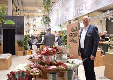 Rene Terlouw of GASA Holland. He is standing next to some Dutch flowers.