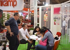 Christophe Camus and Jean-Yves Coulbault of Sicamus talking with visitors.