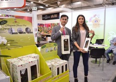 "Sarah L. Corselis and Alan Lu of Okidland France Biotechnology holding the "magic flower pot carry bag"."