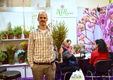 Adaf Nir of Nir Nursery together with the early flowering white wax flower named Luna.