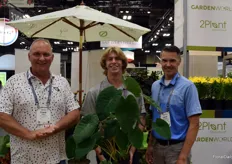 Intern Nolan Wilson from 2 Plant International is holding a winter hard elephant ear, Left and right, Frank Rditeco and Jesse Anderson.
