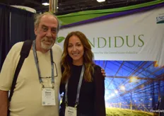 Glenn Behrman from CEA Advisors meeting with Alison Bossio with Candidus, at the Candidus booth.