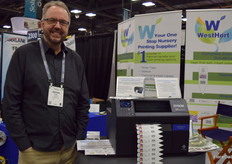 WestHort's James York, next to the full color tag and label printer.