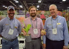 At the Fleurizon booth, Robert Pettorini is holding a Scadoxus and Scadoxus bulbs. On the left, Chris Meshburn, and on the right, Frank de Greef.