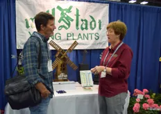 Susie Hines with Millstadt Young Plants, talking to a visitor
