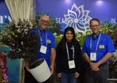 Jessy Hensen, Erika Ramos and Bill Ainley with J Berry. Jessy is holding a Berry Dark foliage, white flowers that don't turn brown.