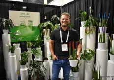 Kyle Breewer of DeRoose Plants holding Top-line Sanseveria.