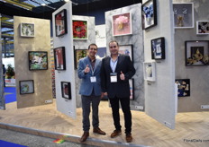 Juan Diego Ucros and Paul Vasco of RoseAmor presenting their preserved flower gallery art.