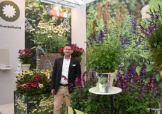 Co Overduin from HilverdaFlorist standing next to his Salvia's.