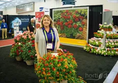 Melanie Fernandes with Syngenta Flowers shows the new Lantana. This sterile variety gets deeper red when it is exposed to sunlight.