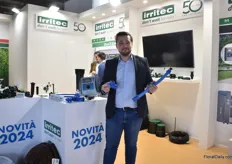Nicolò Cavallini of IRRITEC SPA with the blue lock tube for irrigation systems.