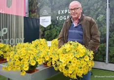 Klaas Droog, sales and license manager at MNP Flowers, from MNP Flowers, with the Surfinia Dark Yellow Morn.