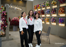 The ladies of Cactus, showing off their roses and carnations, both natural and dyed