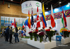 Ayura booth showing many flags from around the world