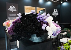 Adriana Satizabal, with special preserved flowers. Look at these black roses!