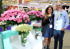 Monica Scaparro and Carlos Castillo of NIRP International, next to the Sweetspot roses