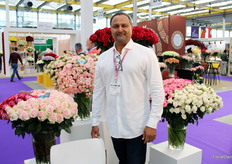 Sachin Appachu of Insinya Group, next to some beautiful Kenyan roses