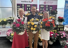 There's been great conversation around the new City Lights Compact series of patio dahlia from Selecta One at California Spring Trials. The dark-colored foliage contrasts beautifully with the bright blooms. Team members are holding the three new colors: Tanya Carvalho (Magenta), Stefan Reiner (Sunny Yellow), and Lauren Blume (Scarlet).