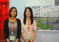Ms. Dawn Lee from Xin Sheng Group and her colleague. XinSheng is a turnkey greenhouse constructor.