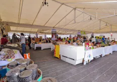 Inside a huge tent, trade show visitors could buy local crafts and foods.