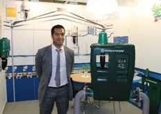Simon Guillaume of Dosatron standing next to the new water powered dosing technology: the D30GL (Green Line)