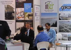 Negotiations at the Inser Booth.