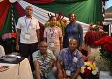 The team of Magnate Flowers in front of the Amaranthus Cyclop Maroon.