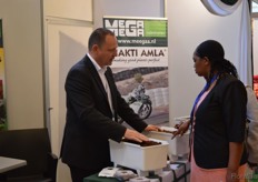 Peter Zethof of Mega Mega Substrates talking with a visitor.