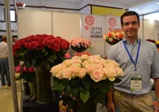 Gavin Mouritzen of Interplant Roses next to the Honululu Rose.