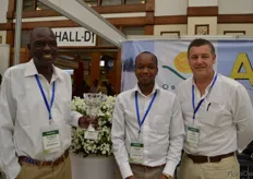 Fredrick Ogweno, Joseph Ndana and Chris Linoley of Oserian in front of the Phlox White Cap that won the Best Flower Quality Award.