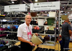 Timothey Allen of East Jordan Plastics with the new 12 inch hanging basket.