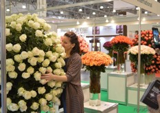 Visitor embracing and smelling the Flowers of NIRP International.