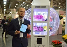 Moksim Dyankov of Fstor. He is presenting a flower automate that can be installed at a retailer, cinema, or restaurant. The owner of the machine can easily track how many and which flowers are sold on the Internet.