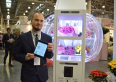 Moksim Dyankov of Fstor. He is presenting a flower automate that can be installed at a retailer, cinema, or restaurant. The owner of the machine can easily track how many and which flowers are sold on the Internet.