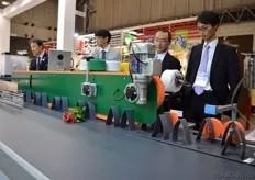 Bercomex machine imported by Impack. The machine cuts the flowers and removes the leaves.