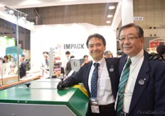 Hideya Sasaki and Toshihisa Tomii of Impack standing next to the Bercomex Machine.