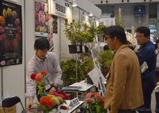 Growers talking with visitors.