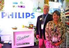 "Andrew Lee and Monica Alvarez of Gloeckner. They supply summer flowers from seed and bulbs and hardware to the Colombian growers. They are also promoting the philips flowering lamp as they are hortpartners with philips. "This flowering lamp will be the next thing here in Colombia. It creates better quality plants and saves on electricity costs," says Lee."
