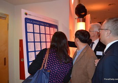 Attendees looking for their tables.