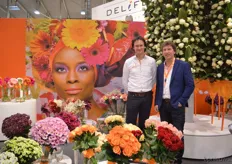 Dennis van Dijk and WIlco Verkuil of Dümmen Orange. In front of them, the orange rose that was baptized by soccer player Clarence Seedorf.