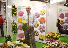 Alain Sauve of Sauve holding the Miss Daily Dore. Sauve is specialized in the breeding of pot chrysanthemums.