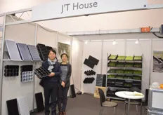 John Park and Moon of J'T House. Park is holding the ornamental double 6 tray.