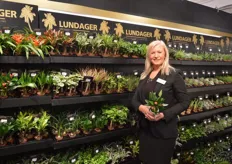 Olga Lundager of Lundager. She is holding the minianthurium Million Flowers Red, which has been introduced three months ago. They invested 2 years in testing the plant. The demand for this minianthurium is increasing fast.